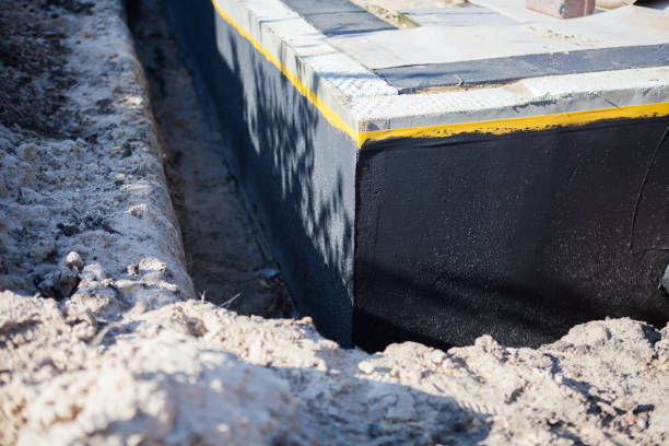 Professional Wet Basement Repair technician working in Martinsburg, OH